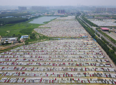 New cars outside the Brilliance factory in Shenyang, China.
