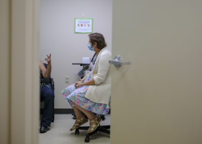 Dr. Deborah Gentile, an asthma specialist, speaks with a patient at the Cornerstone Care clinic in Clairton.