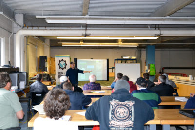 Oil and gas workers at a renewable energy training session hosted by the nonprofit Iron &amp; Earth in Alberta.