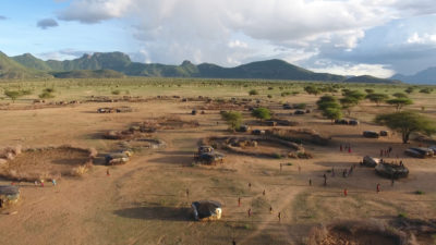 A Samburu village on the edge of Kirisia forest, seen in the background.