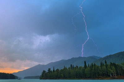 Lightning over the Katun River in Siberia, August 5, 2014. 
