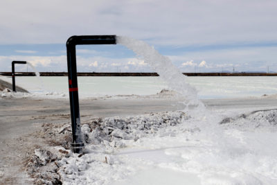 Lithium-rich brine is pumped into evaporation pools at a mine in Potosi, Bolivia. 