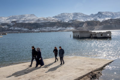 Residents of Hasankeyf, Turkey, visit the remains of their former homes along the Tigris River, which were submerged by the Ilisu Dam in 2020.