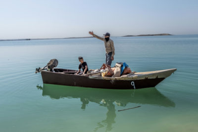 Fisherman Muhammet Nemrik says Iraq's Mosul Dam reservoir on the Tigris River has shrunk dramatically because of drought.