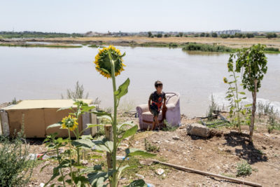 Abuzer Mahmoud, a 12-year-old Romani boy in Bismil, Turkey. Abuzer's family fled the civil war in Syria and now spends most of the year living in tent camps along the Tigris.