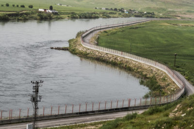 Where the Tigris River divides Turkey and Syria, Turkish authorities have built a border fence to stop illegal crossings.