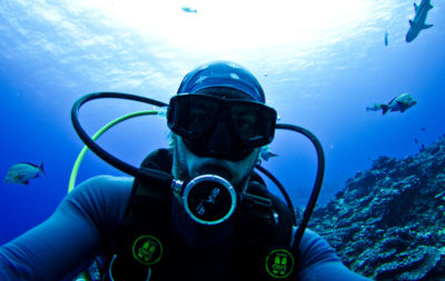 Biologist Mike Gil scuba diving in French Polynesia.