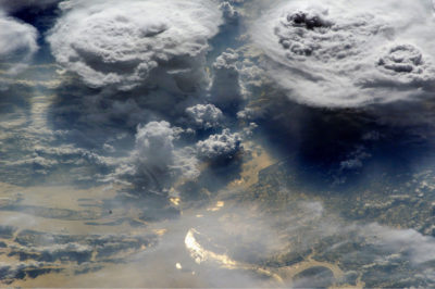 Researchers hope incorporating artificial intelligence into climate models will further understanding of how clouds, shown here over Bangladesh, will act in a warmer world.