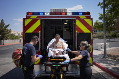 First responders treat Deb Billet, 66, for heat-related symptoms, Henderson, Nevada, July 10, 2024.