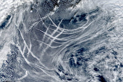 A satellite view of aerosol trails left by ships crossing the North Pacific.