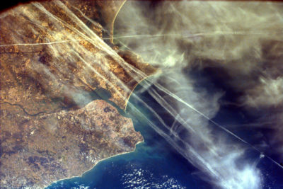 Contrails over Lisbon, Portugal, in February 2000.