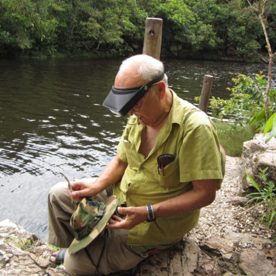 Retired pediatrician Emilio Rolán, seen here on a trip to Brazil, has discovered 1,500 new species since 1980. He keeps thousands of marine snail specimens at his home in Spain.