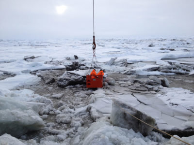Scientists test the age of sea ice off the northern coast of Russia.