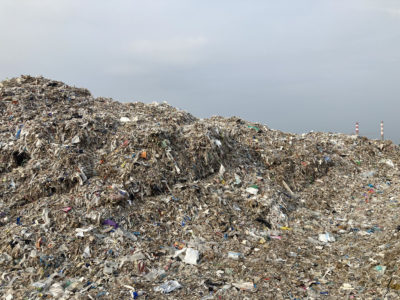 A massive mound of plastic waste next to Indah Kiat Pulp &amp; Paper Products in Serang, Indonesia.