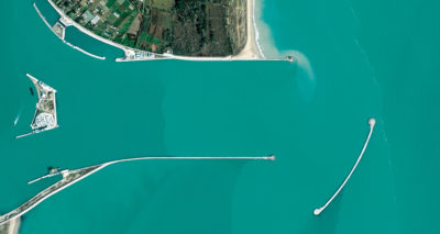 An aerial view of the $6-billion MOSE system in Venice, Italy, a network of 78 steel gates designed to hold back sea level rise and protect the city from storm surges from the Adriatic Sea. Venice, built on top of a lagoon, already experiences regular flooding as high tides bring water into the city’s streets. The MOSE system, scheduled for completion in 2022, will be capable of stopping tides up to 9.8 feet.