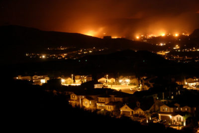 A wildfire moves closer to neighborhoods in Santa Clarita, California in 2007.
