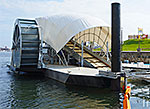 Trash-collecting water wheel in Baltimore